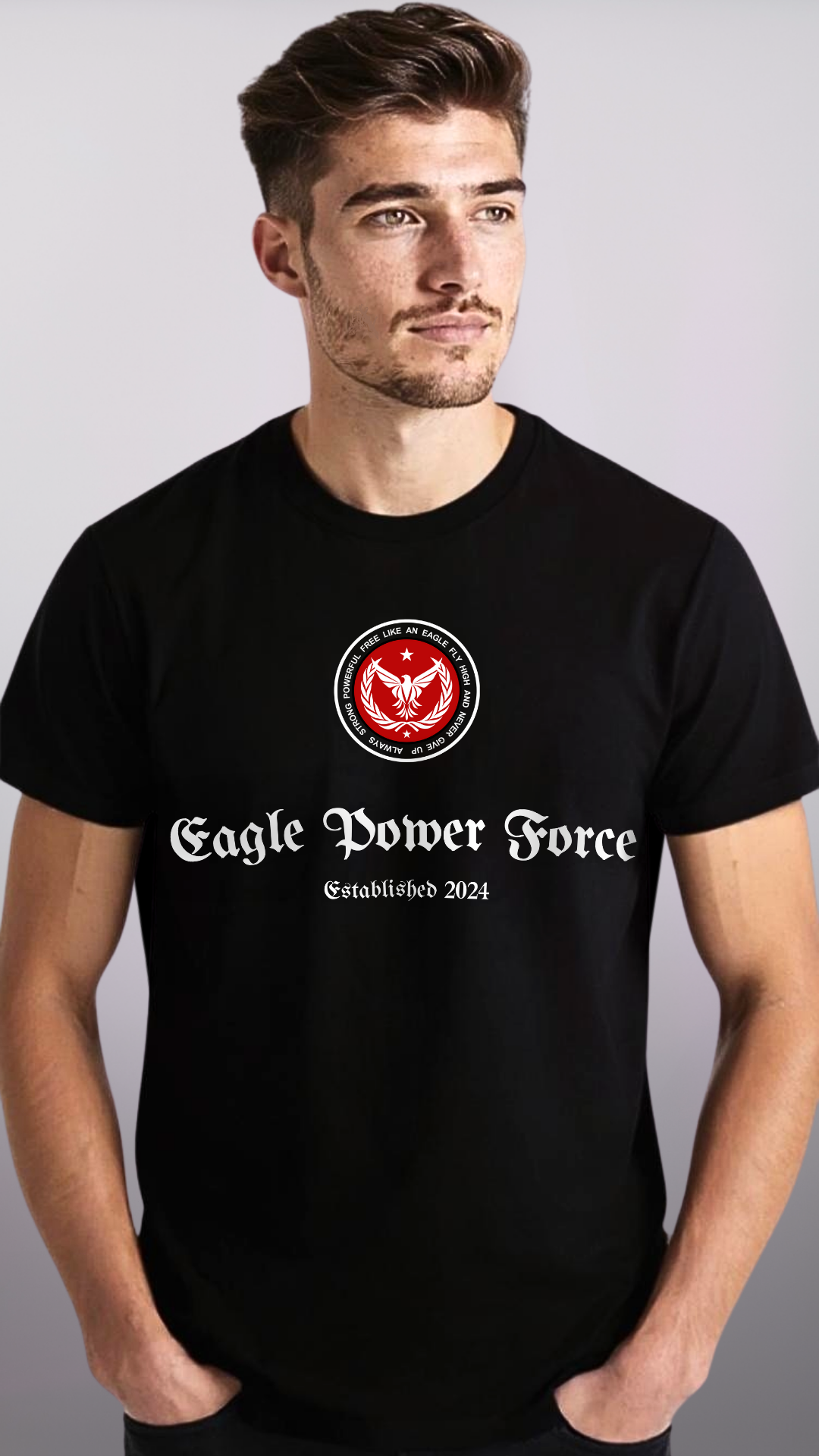 Boy wearing a black t-shirt with 'Eagle Power Force' 