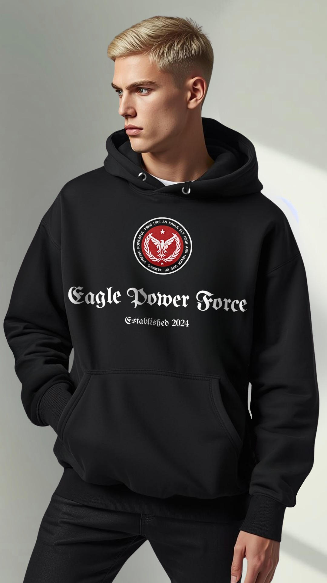 Boy wearing a black hoodie with 'Eagle Power Force'