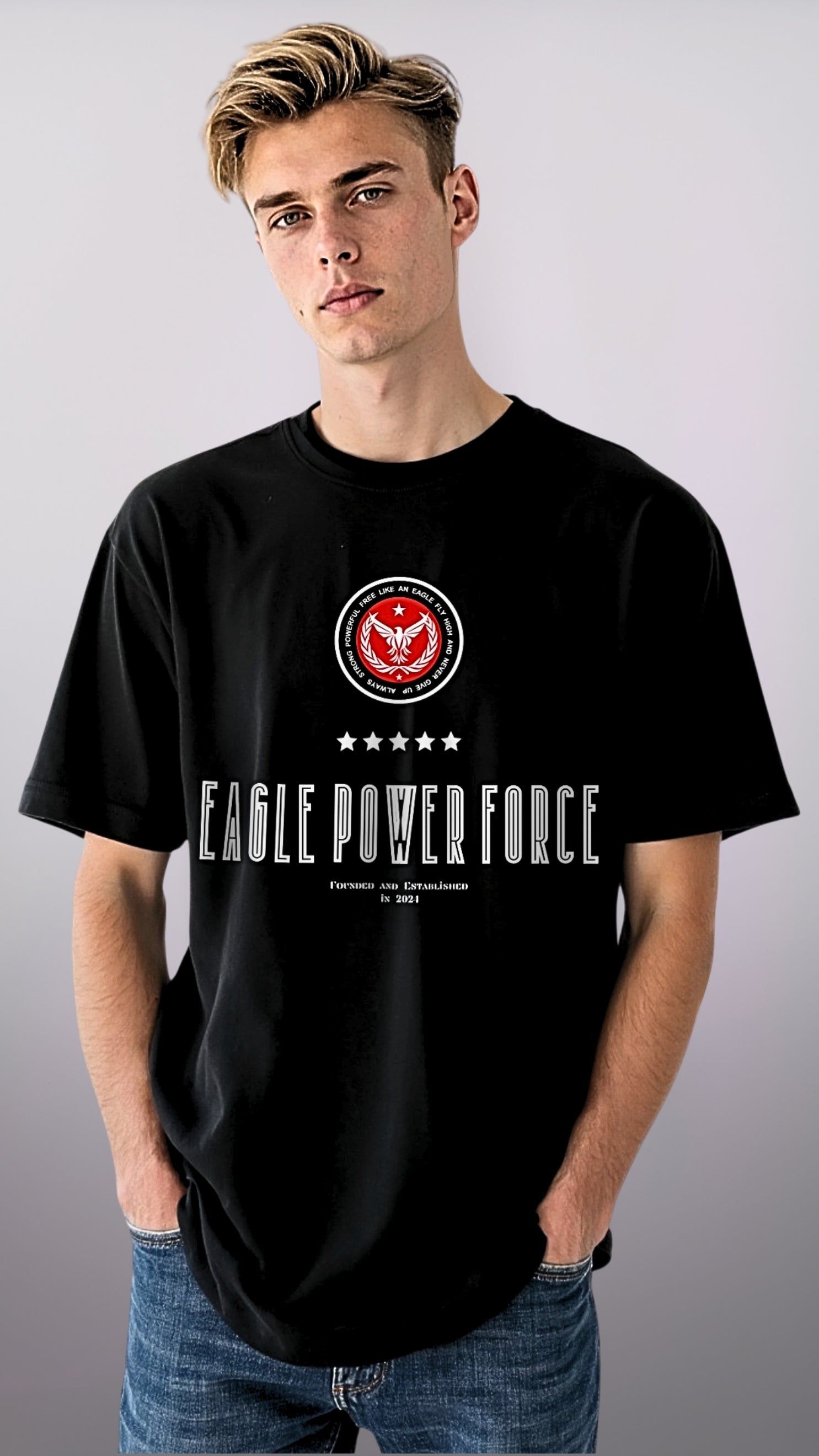 Boy wearing a black t-shirt with 'Eagle Power Force'