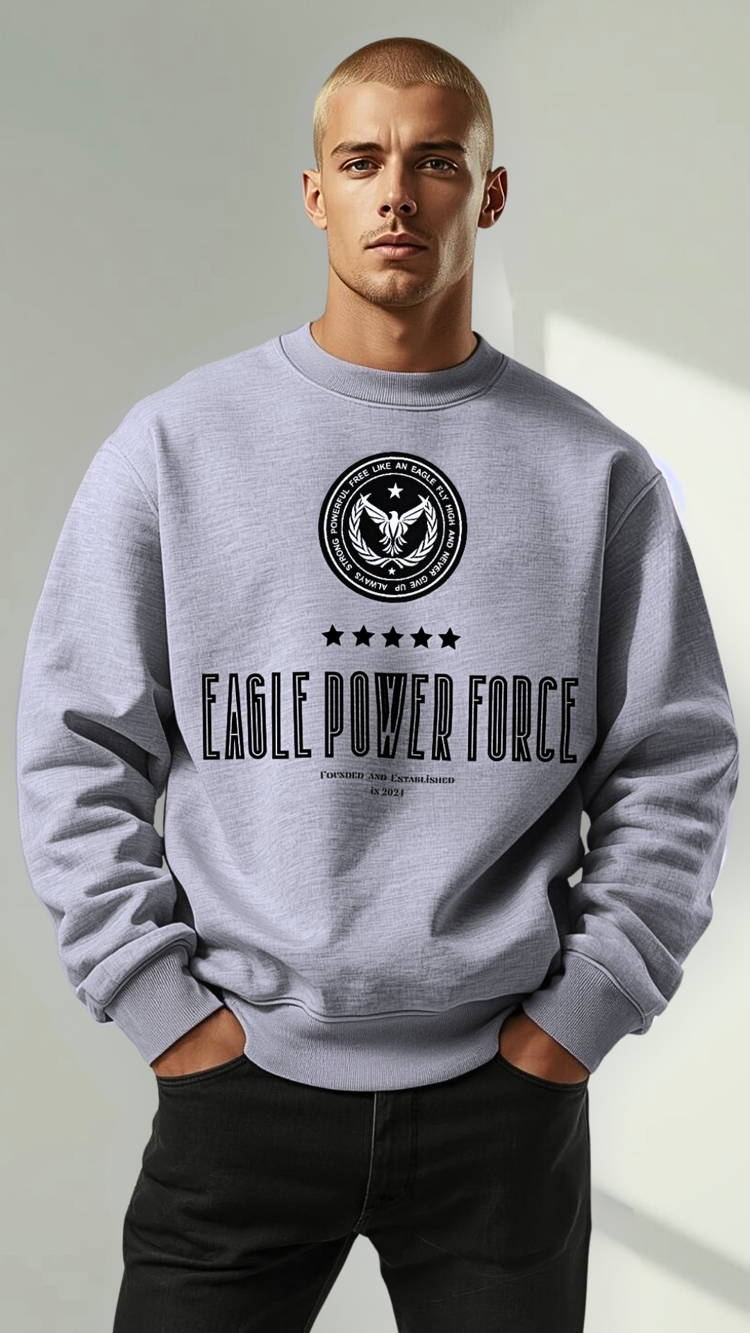 Man wearing a gray sweatshirt 'Eagle Power Force' 