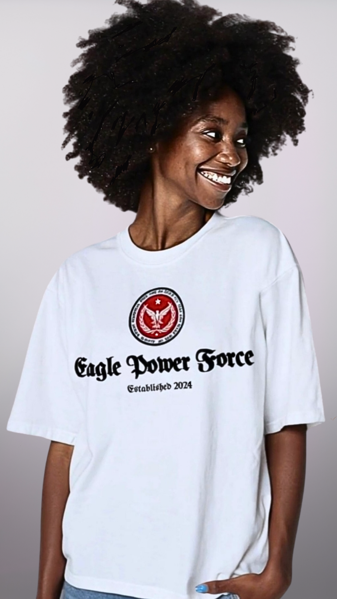 Girl wearing a white t-shirt with 'Eagle Power Force'